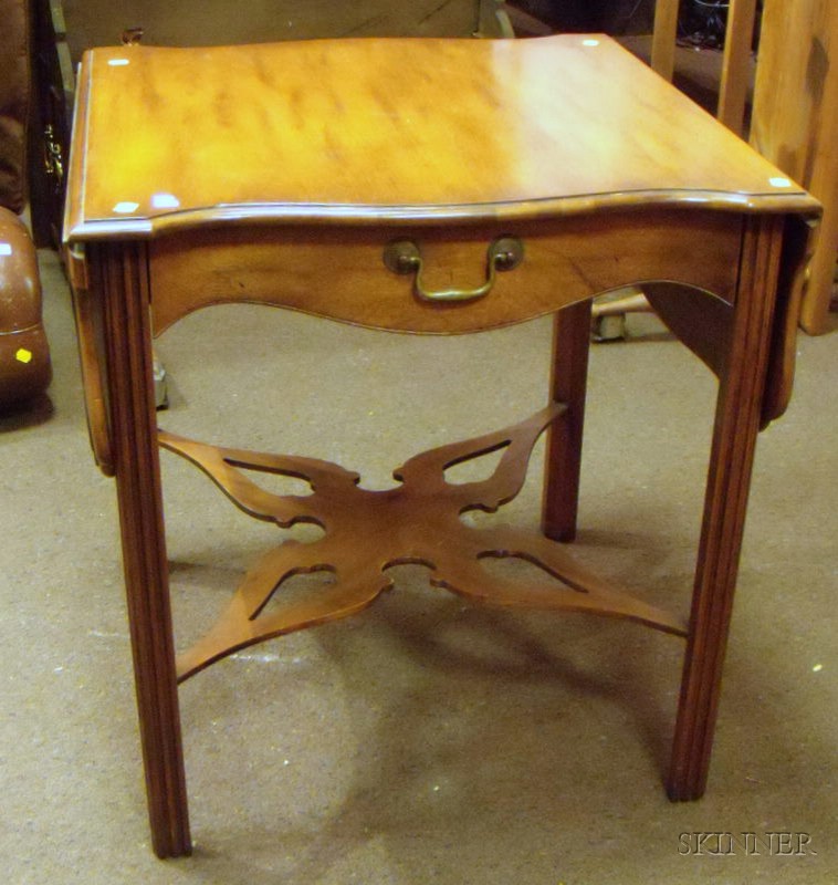 Appraisal: Baker Furniture Chippendale-style Mahogany Serpentine Drop-leaf Pembroke Table with Drawer