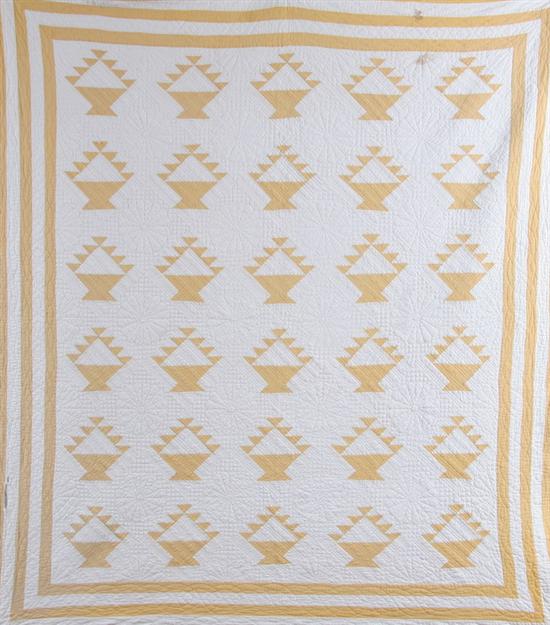 Appraisal: FLOWER BASKET QUILT th century Pieced and quilted yellow flower