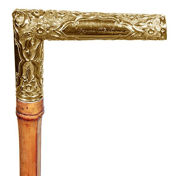 Appraisal: Gold Dress Cane Ca - An L-shaped presentation gold-filled handle