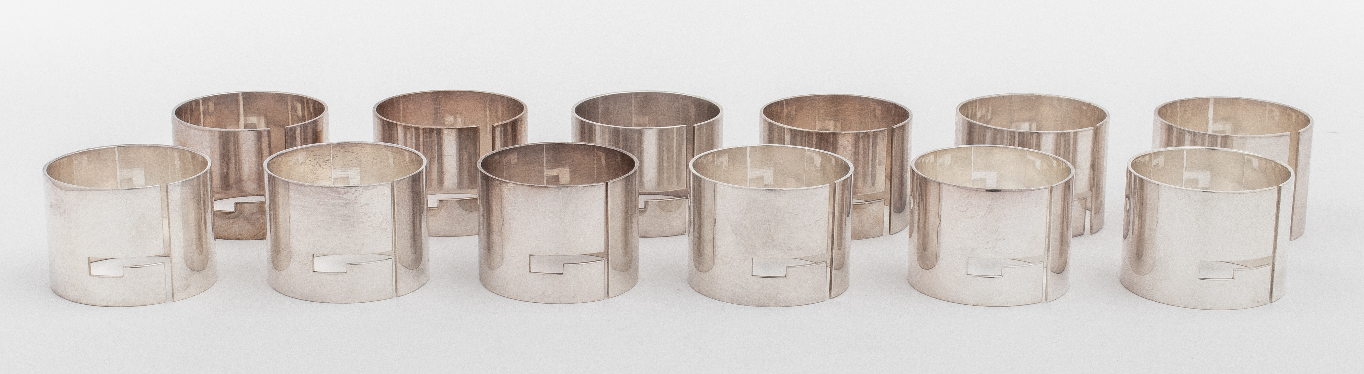 Appraisal: GUCCI STERLING SILVER NAPKIN RING SET Gucci sterling silver napkin