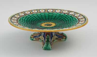 Appraisal: A Wedgwood Majolica Tazza Raised plate on tri-footed base plate