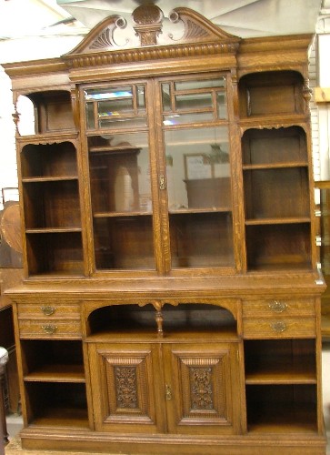 Appraisal: LARGE OAK BOOKCASE SIDEBOARD English c The top section is