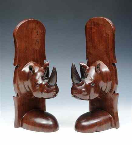 Appraisal: A PAIR OF CARVED HARDWOOD BOOK ENDS in the form