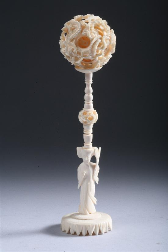 Appraisal: CHINESE IVORY PUZZLE BALL AND STAND the ball with openwork