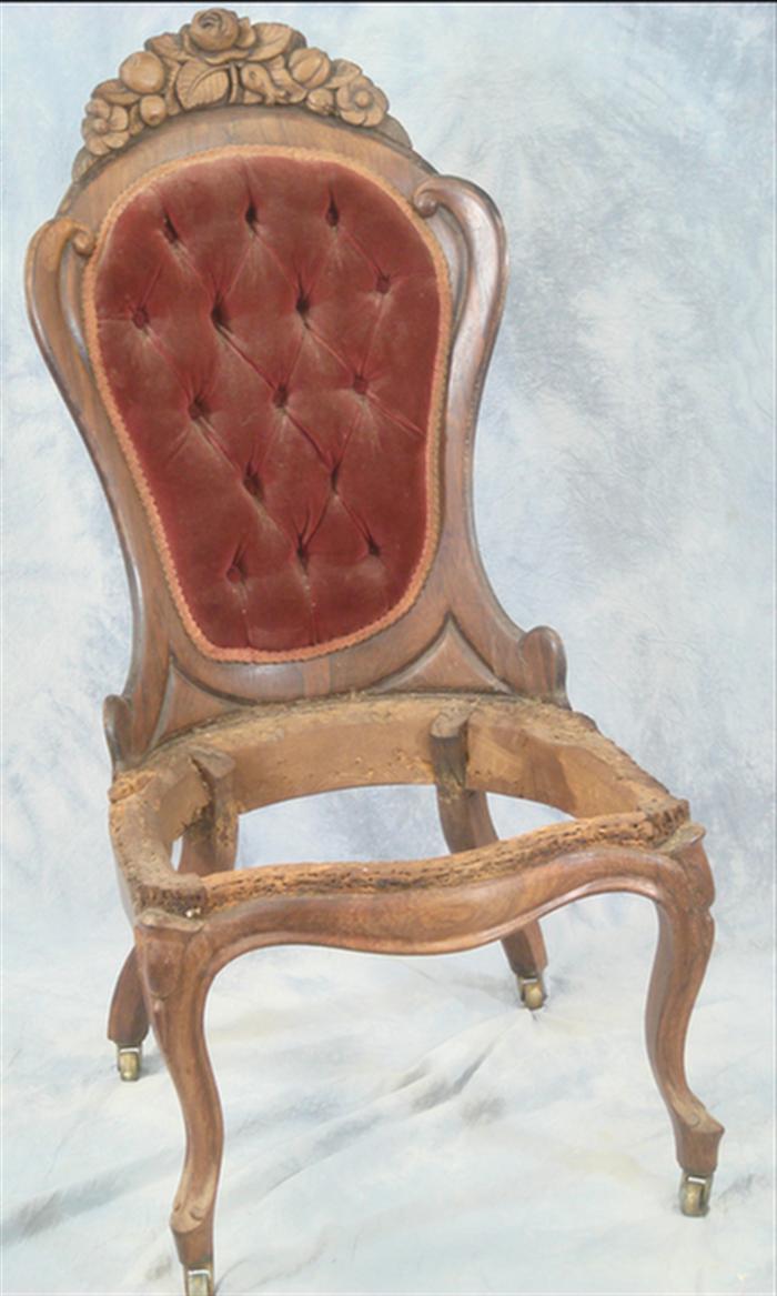 Appraisal: Laminated rosewood Victorian side chair with floral crest tufted upholstered