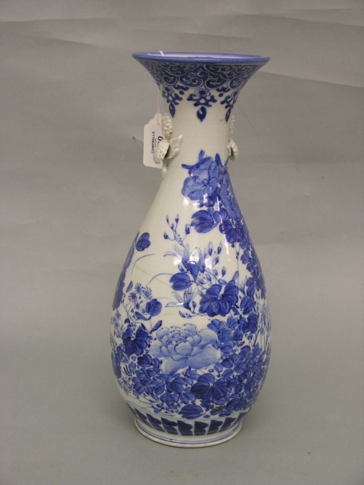 Appraisal: A Chinese baluster vase painted with shrubs and plant life