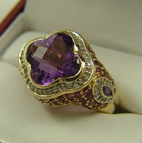 Appraisal: AMETHYST AND DIAMOND RING K yellow gold wet with a