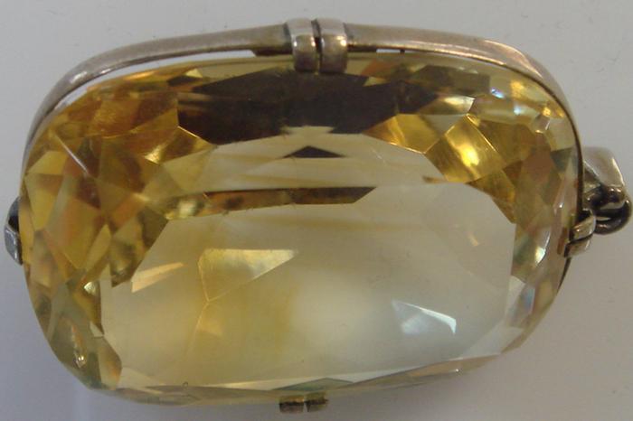 Appraisal: Sterling Citrine Pendant Plain band frame containing a cushion cut