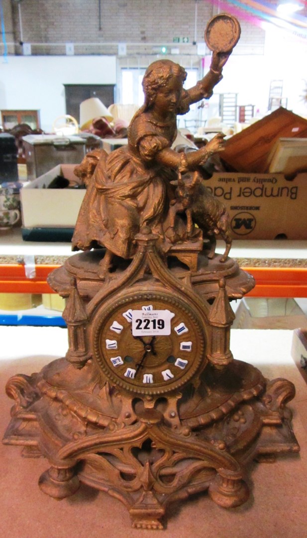 Appraisal: A gilt metal mantel clock electric movement