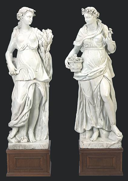 Appraisal: A pair of Continental glazed earthenware figures of Spring and