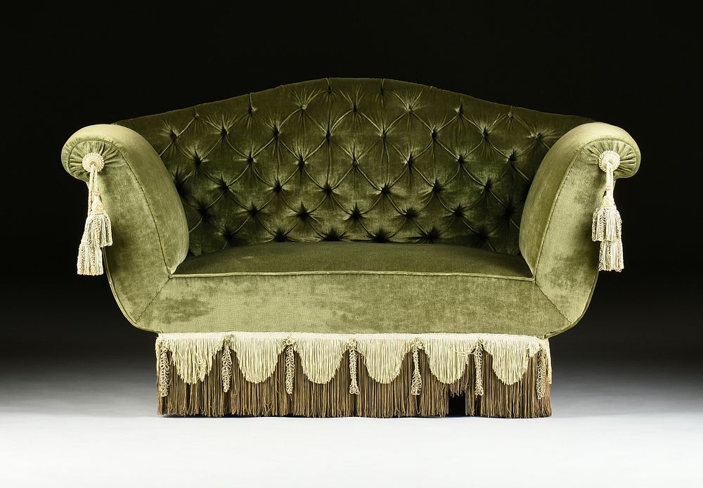 Appraisal: A VICTORIAN STYLE GREEN SILK VELVET AND PASSEMENTERIE FRINGED LOVESEAT