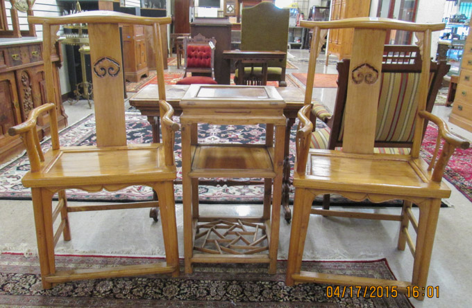 Appraisal: PAIR CHINESE ARMCHAIRS WITH THREE-TIER SIDE TABLE Yumu northern elm