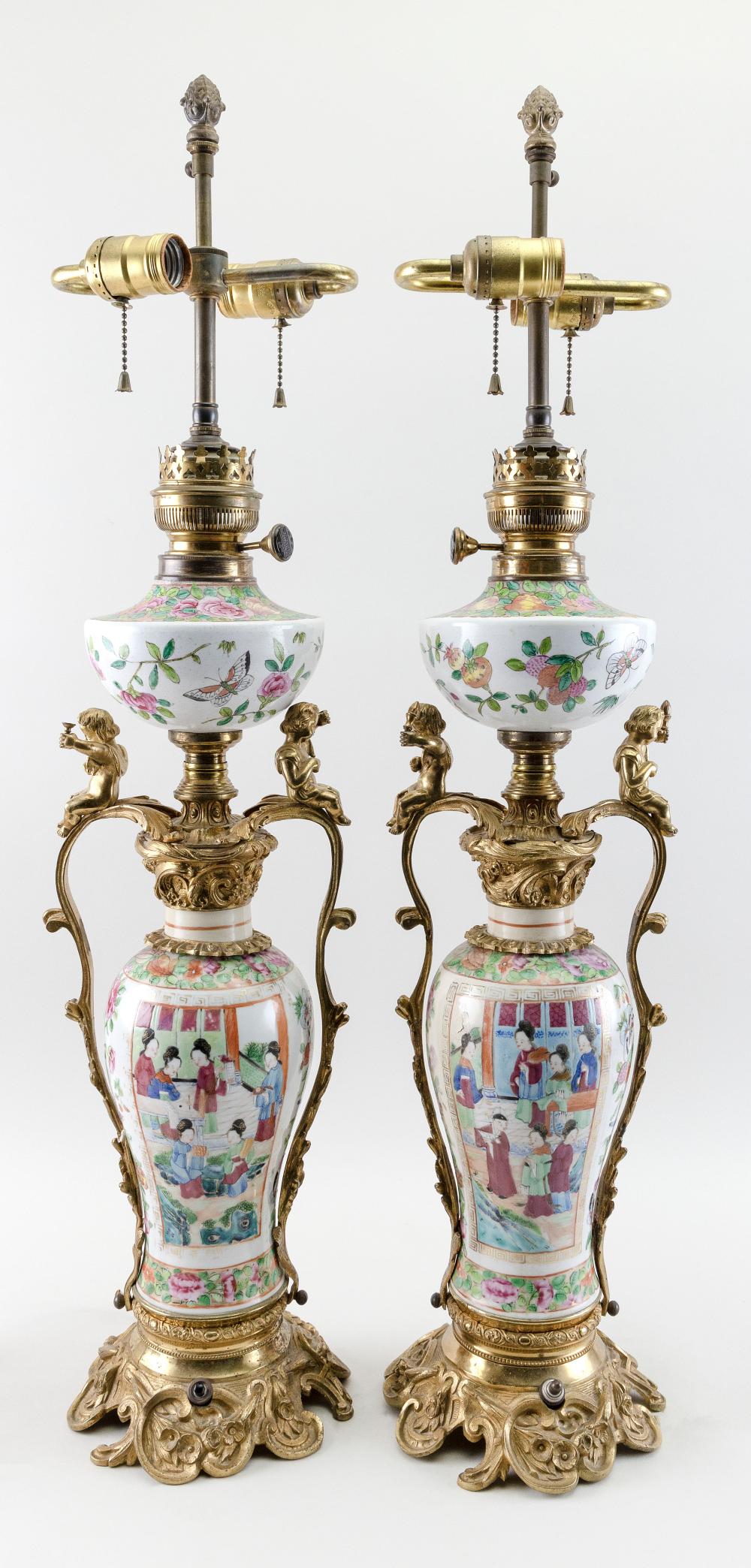 Appraisal: PAIR OF BRONZE-MOUNTED CHINESE EXPORT PORCELAIN VASES CONVERTED TO TABLE