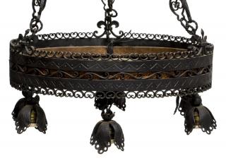 Appraisal: IRON PIERCED COPPER SEVEN LIGHT CHANDELIER Iron and copper seven