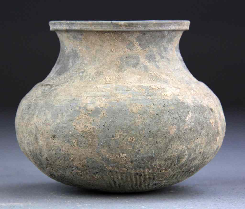 Appraisal: Chinese Han Dynasty Storage JarWith rounded bulbous base condition commensurate