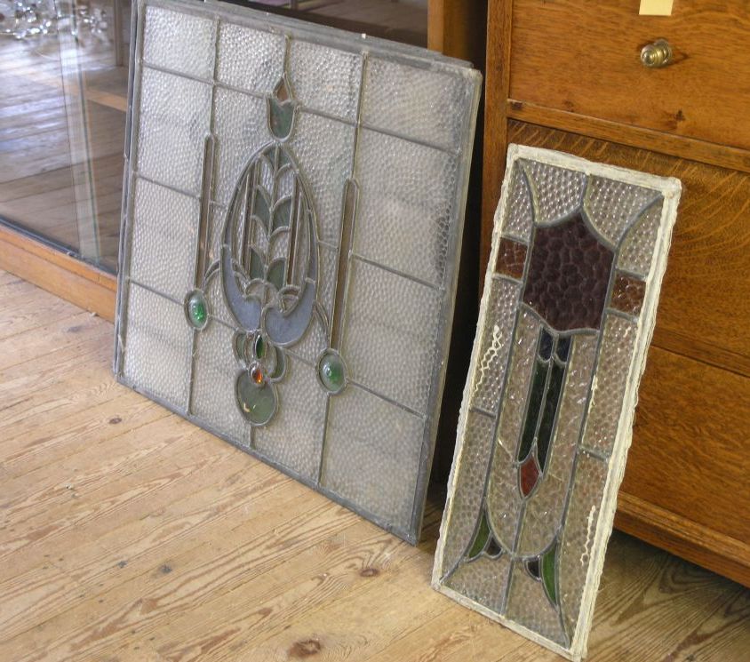 Appraisal: A set of five stained glass panels within leaded frames