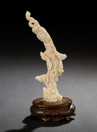 Appraisal: Chinese Carved Angel Skin Coral Figure of a Deity th