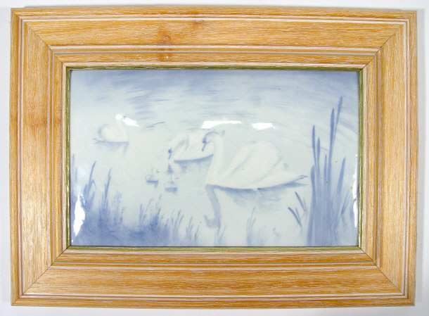 Appraisal: Rectangular china plaque hand painted with blue swans amongst reeds