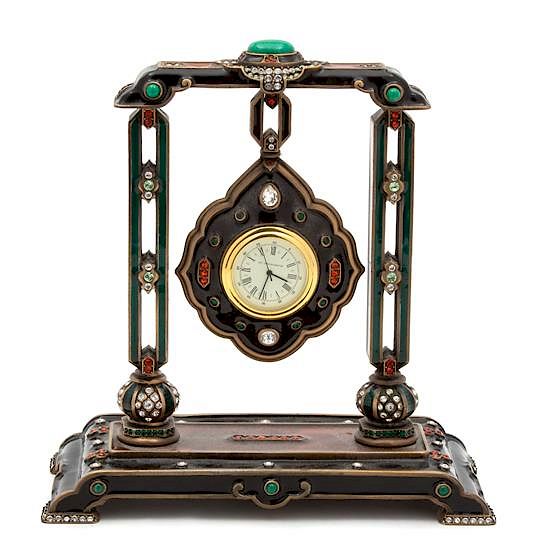 Appraisal: An American Enamel and Brass Desk Clock Height x width