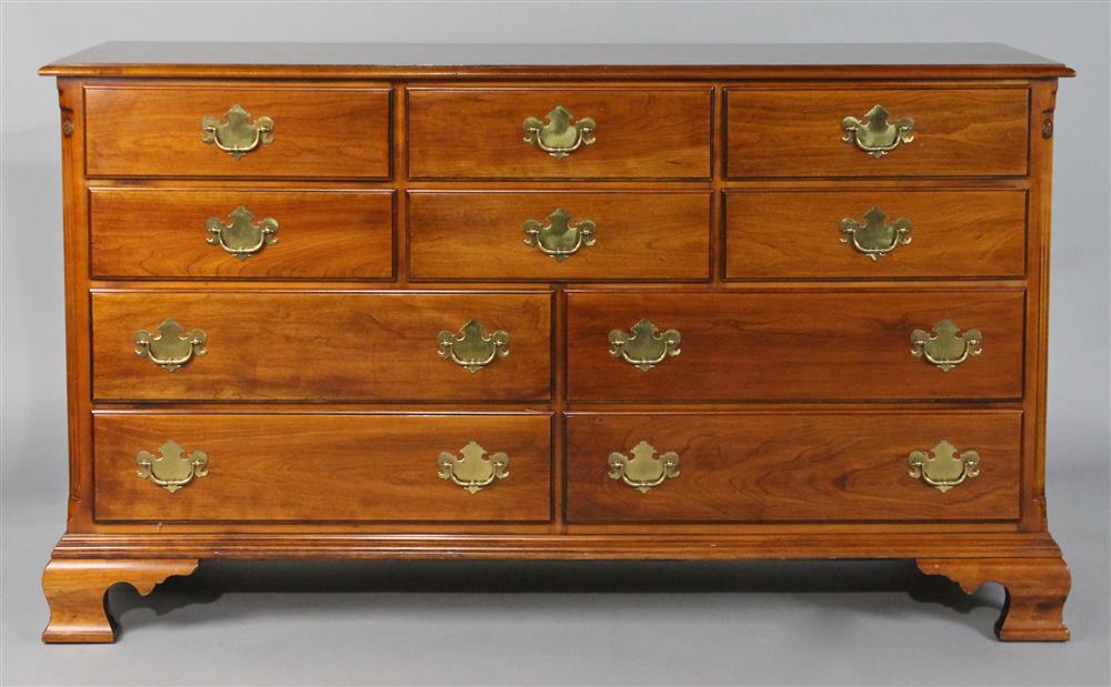 Appraisal: STATTON CHIPPENDALE STYLE CHERRY TRIPLE DRESSER having a rectangular molded