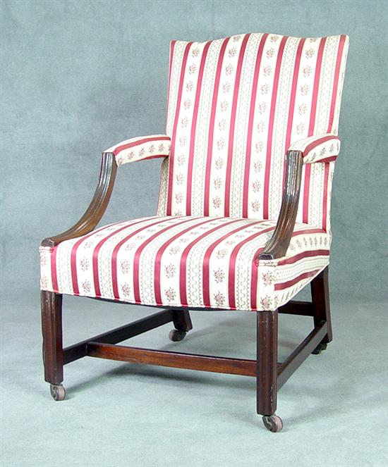 Appraisal: Mahogany Chippendale Style Lolling Chair th Century Molded arms and