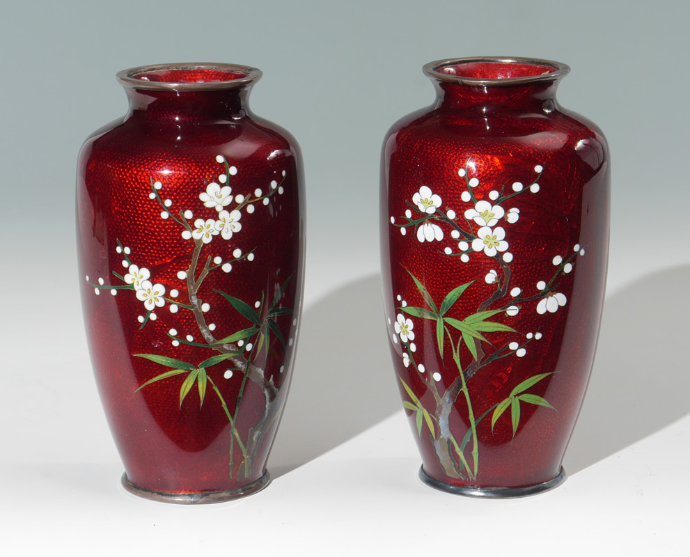 Appraisal: JAPANESE OXBLOOD CLOISONNE VASES Baluster form vases oxblood ground floral