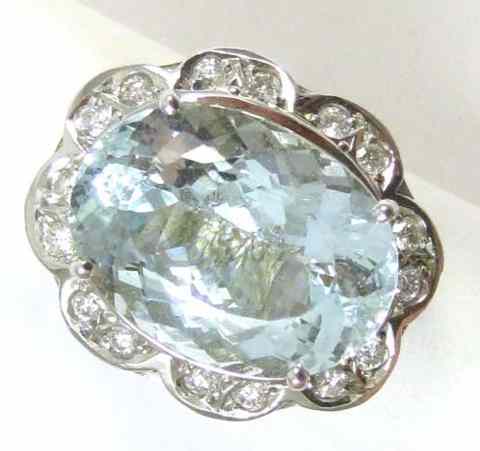 Appraisal: AQUAMARINE AND DIAMOND RING k white gold with round-cut diamonds