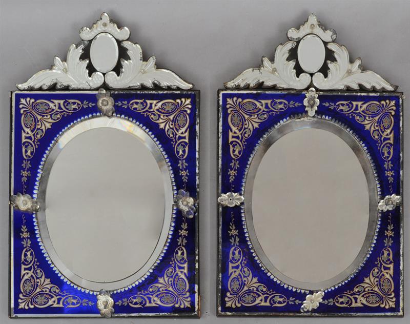 Appraisal: PAIR OF VENETIAN ENAMELED GLASS MIRRORS Each oval beveled plate