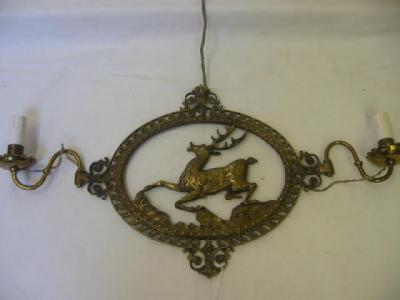 Appraisal: A PAIR OF BRASS TWIN BRANCH WALL LIGHTS of pierced