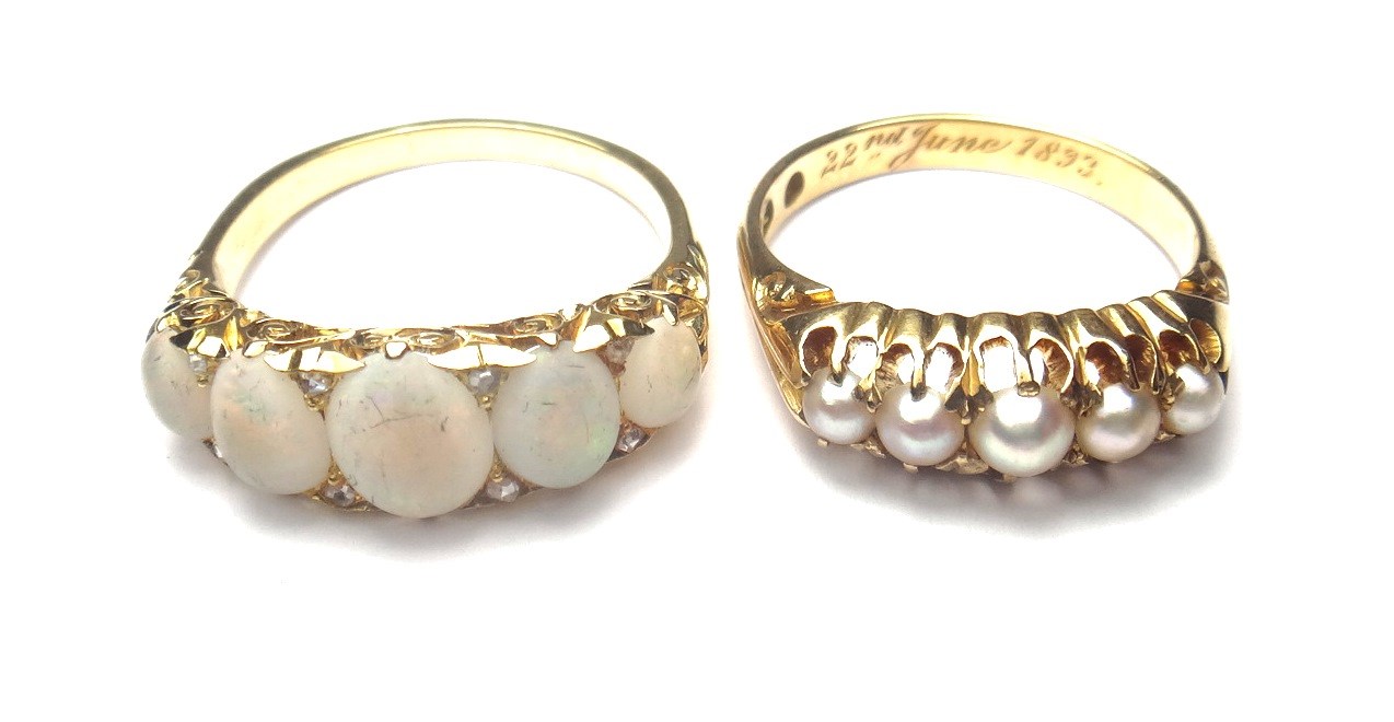 Appraisal: A gold and opal set five stone ring mounted with