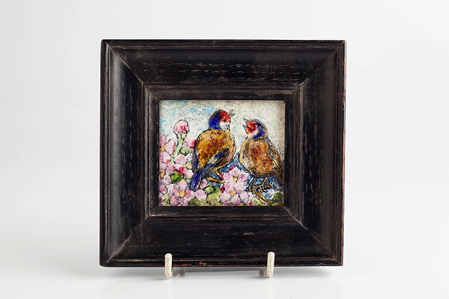 Appraisal: Manner of Charles Fleetwood VarleyArts Crafts enamel panelof two birds