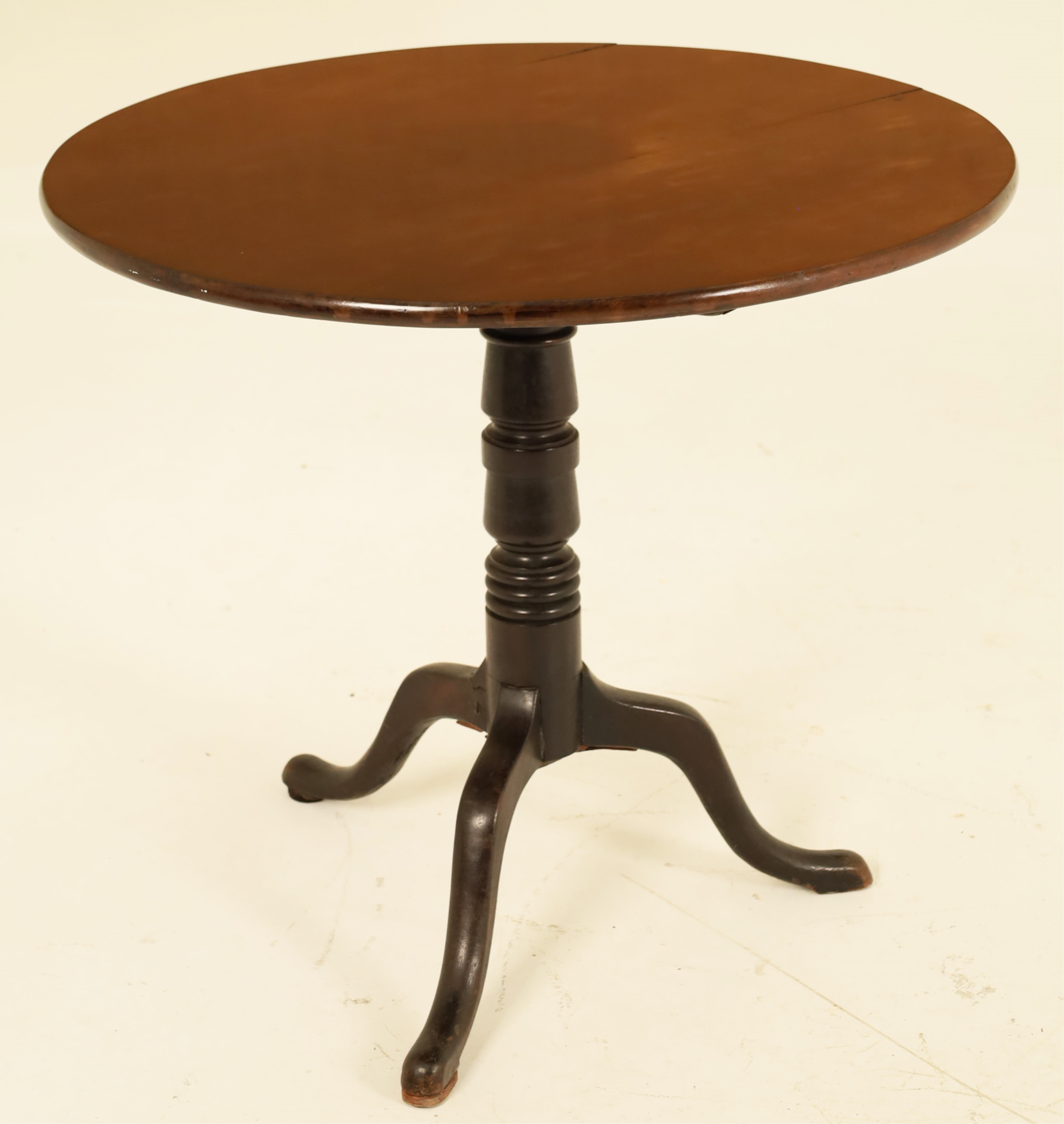 Appraisal: TH C GEORGIAN MAHOGANY TRIPOD TILT TABLE Georgian mahogany tripod