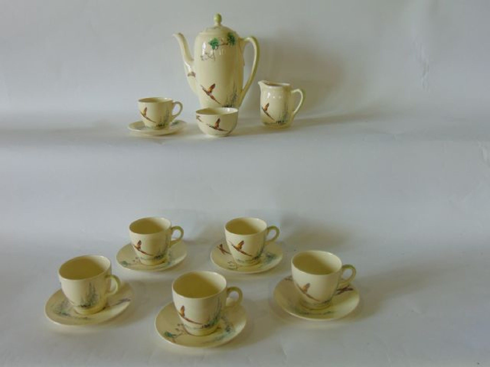 Appraisal: A six place Royal Doulton The Coppice pattern coffee service