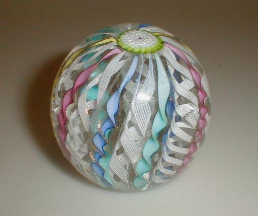 Appraisal: A paperweight with laticcino and ribbon multi coloured twists one