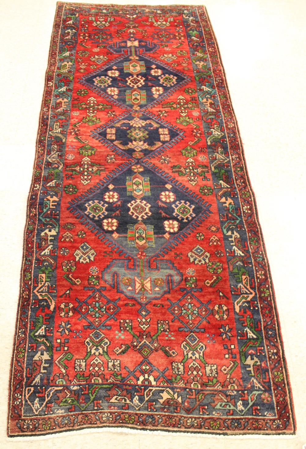 Appraisal: HAND KNOTTED PERSIAN TRIBAL AREA RUG triple blue diamond medallion