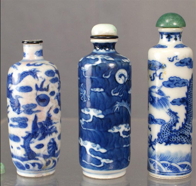 Appraisal: cylindrical porcelain snuff bottles each with blue underglaze dragon seeking