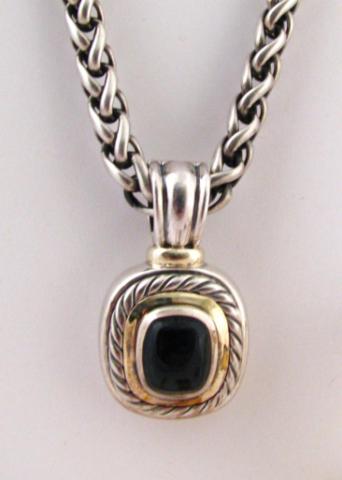 Appraisal: David Yurman K yellow gold and sterling onyx pendant with