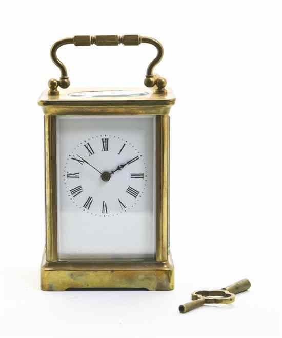 Appraisal: A French Brass Carriage Clock of rectangular handled form having