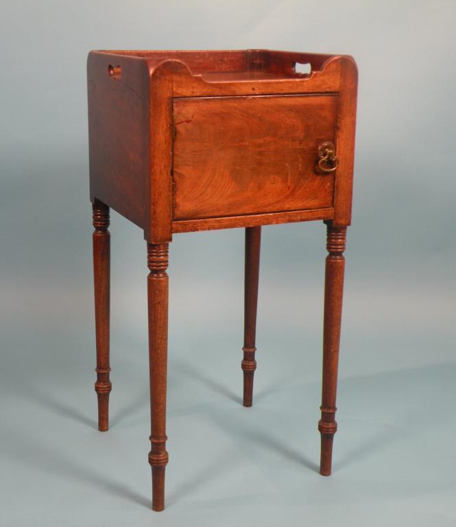 Appraisal: An early thC mahogany pot cupboard with a raised gallery