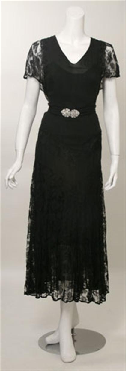 Appraisal: Black silk and lace dress s Long sheath dress with