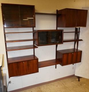 Appraisal: Rosewood Wall Shelf Unit cabinets including drop down units assorted