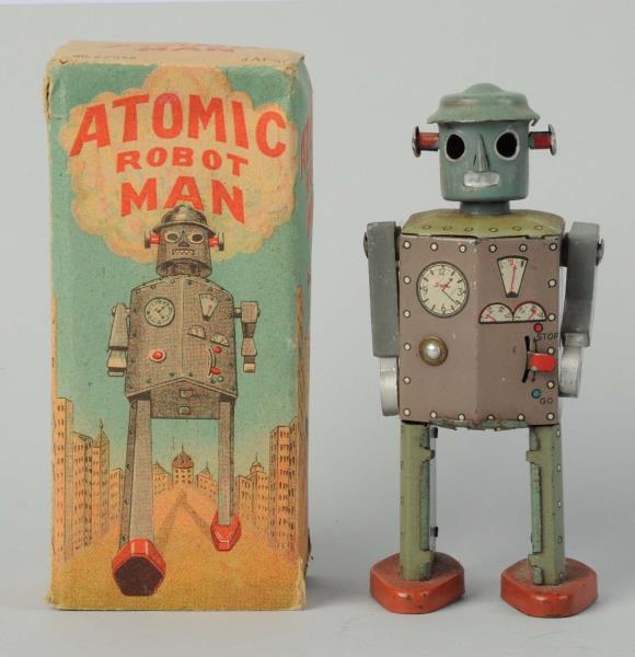 Appraisal: Japanese Tin Litho Atomic Robot Man O B Includes scarce