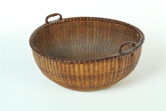 Appraisal: NANTUCKET BASKET Late th-early th century Round basket with carved