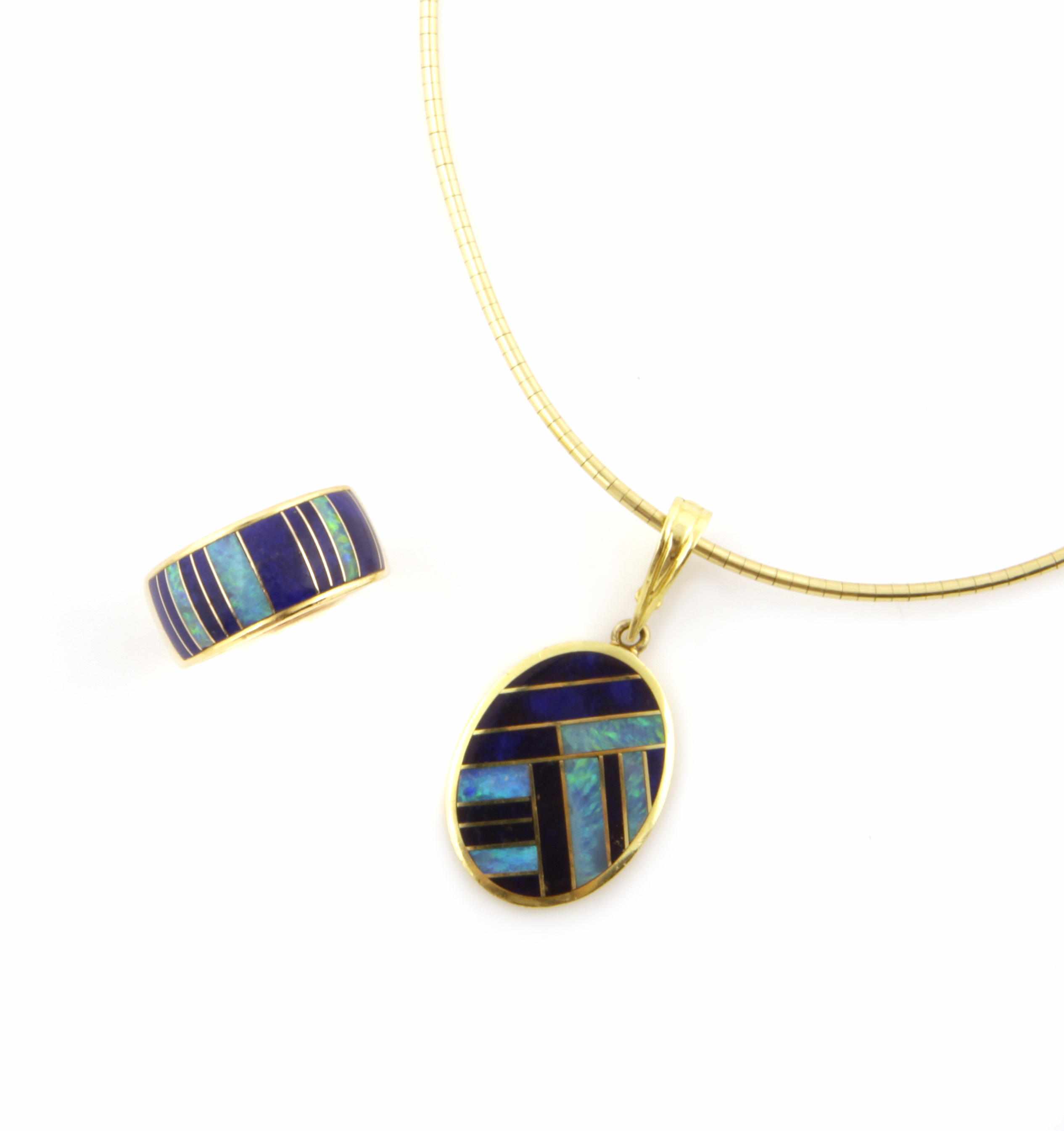 Appraisal: An opal lapis lazuli and k gold pendant chain and