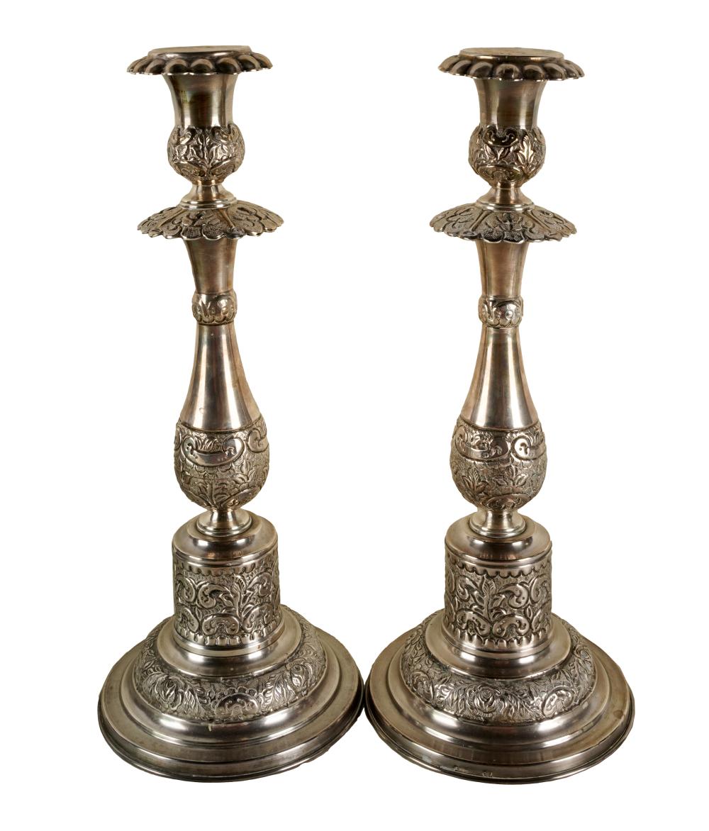 Appraisal: PAIR CONTINENTAL REPOUSSE STERLING CANDLESTICKSeach with illegible hallmarks further marked