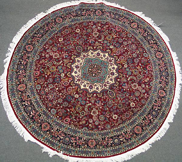 Appraisal: A Kashan design rug size approximately ft x ft