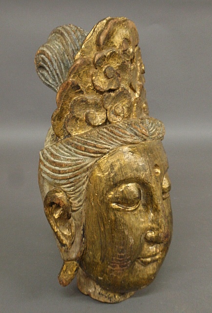 Appraisal: - Finely carved Buddha head th c with gilt decoration