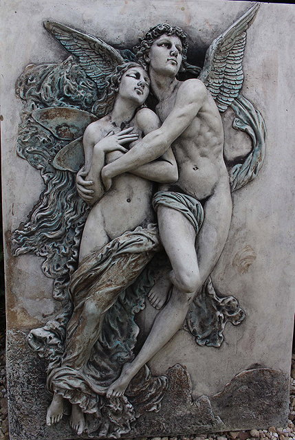 Appraisal: A LARGE CAST COMPOSITE STONE PLAQUE OF CUPID AND PSYCHE