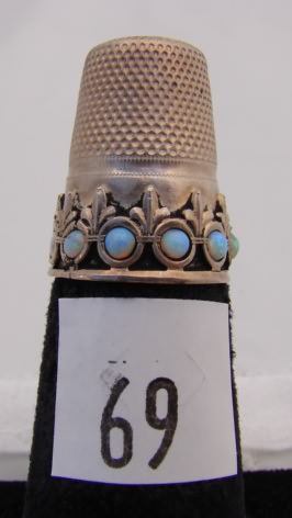 Appraisal: German silver thimble with opal stones on band