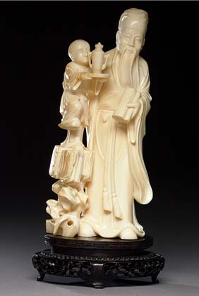 Appraisal: CHINESE CARVED IVORY GROUP Very finely detailed Chinese carved ivory